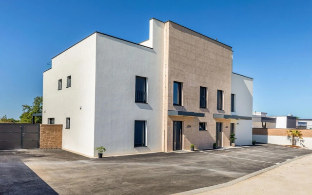 Awesome Home in Peroj With Outdoor Swimming Pool, Wifi and 2 Bedrooms